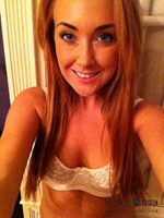 Lucy Anne in her white lingerie alone in her bedroom
