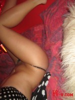 Lucy V shows off her busty breats from her polka dot outfit