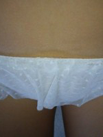 Lucy V peels off her white lingerie at home