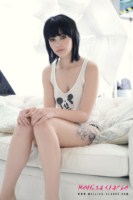 Mellisa Clarke stipping from her Mickey Mouse Tee
