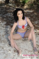Mellisa Clarke strips from her cute lingerie on the beach