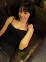 Mellisa Clarke strips in on the leather couth from her jeans and top