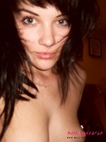 Mellisa Clarke plays about in her bedroom in just her peace sign leggings