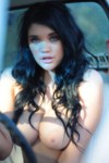 Josie Lilly peels off her top, little denim shorts and red lingerie and plays with her stockings, 150 Images in this Photoset.