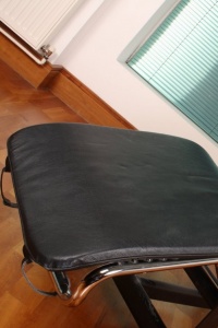 UKTeaze: Jasmin does a striptease on a black lounge chair